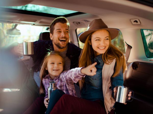 Family in a Rental Car