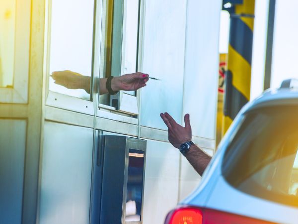 Person paying Toll Fee
